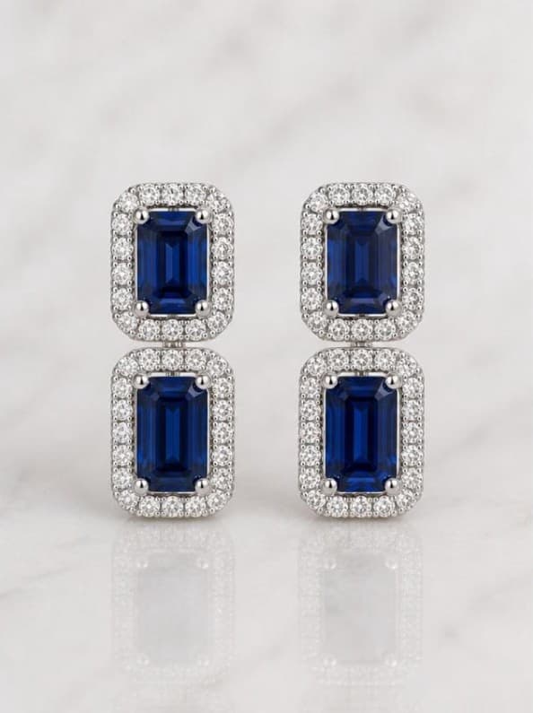 Zafiro Real — Oro blanco 18k, Doble esmeralda · pavé